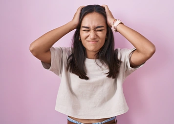Having low self-confidence or withdrawing from social situations